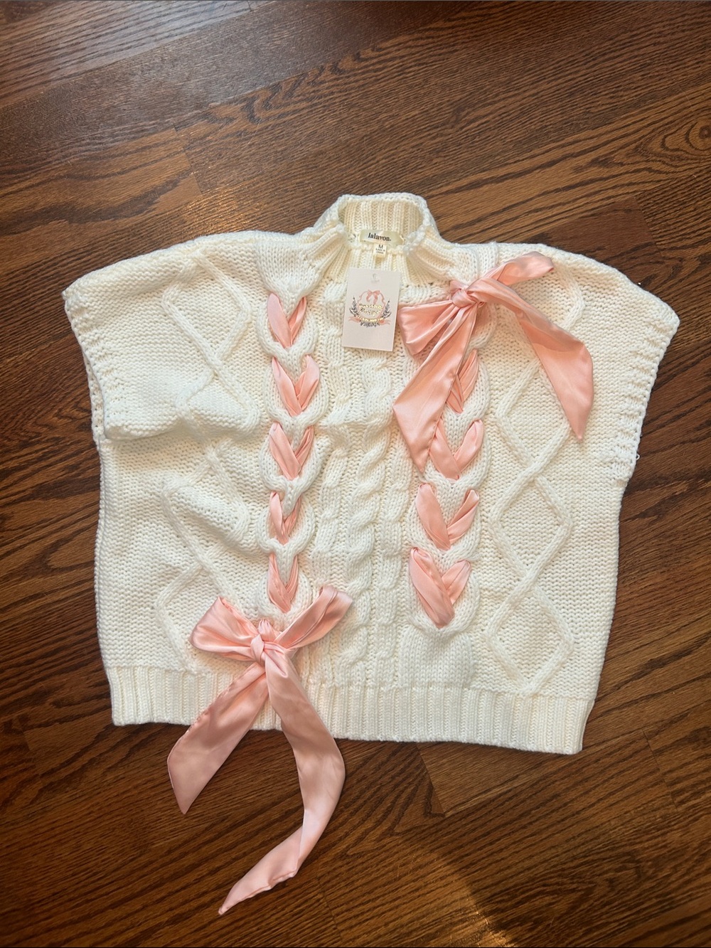 NWT Lalavon Cable Knit Cream  Sweater Poncho with Pink Ribbon Detail Size M